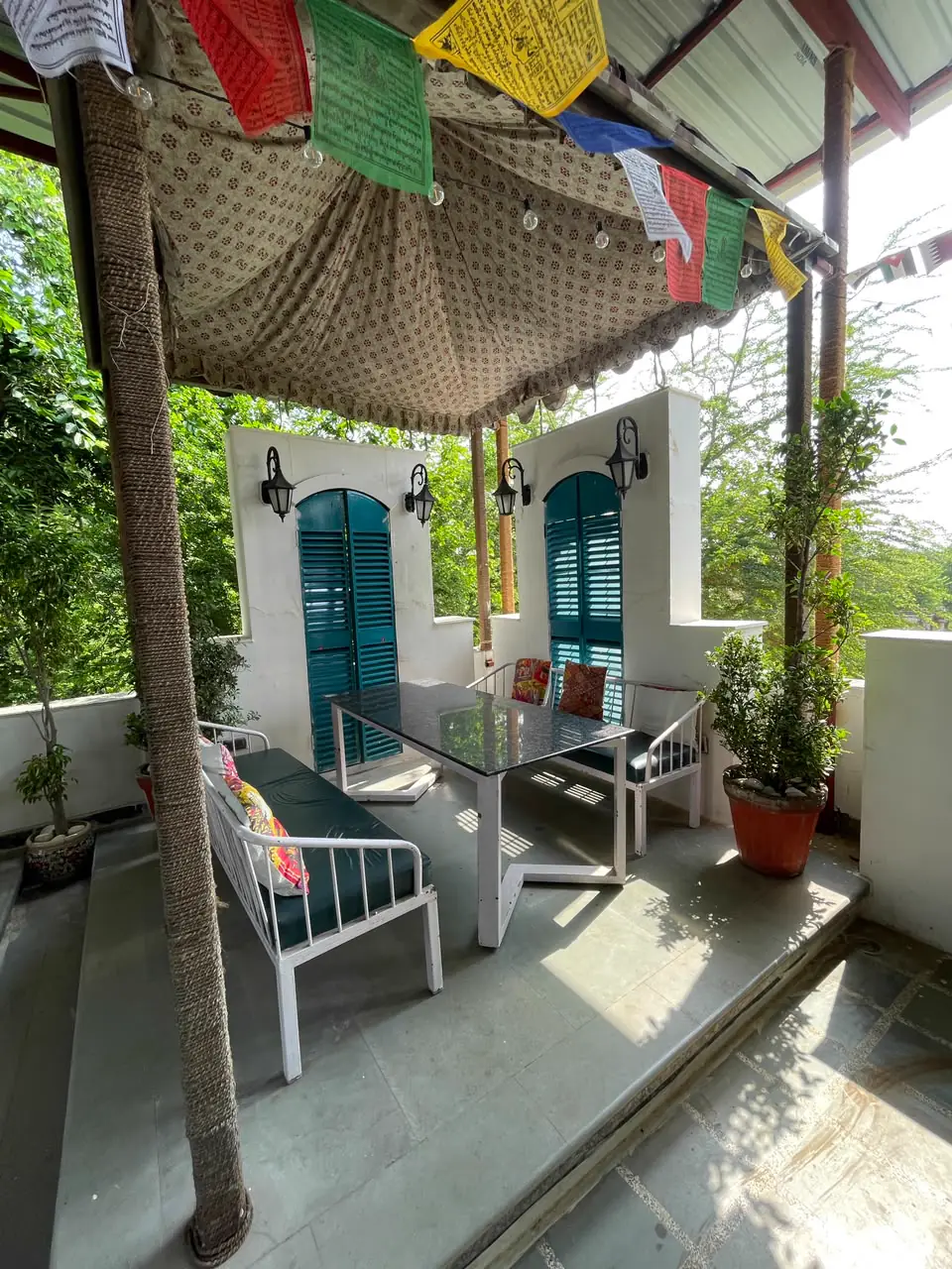 Shaded corner seating with block-print canopy